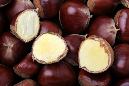 Close up of chestnuts in a market stall, England, UKの写真素材