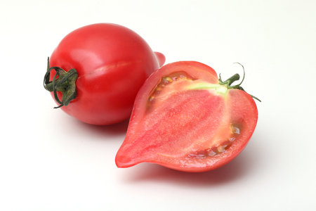 Tomatoes on a white background, close-up, isolated.の写真素材