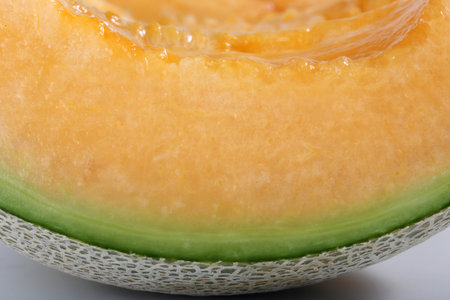 Close-up of cantaloupe melon on white backgroundの写真素材