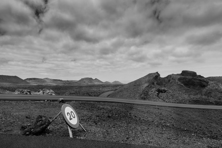 Driving along dried deposits of volcanic eruptions in Lanzaroteの写真素材
