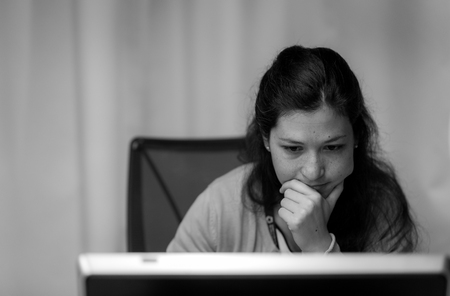 A scientist working on a laboratory computerの写真素材