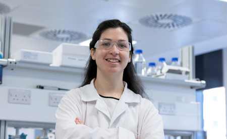 A female scientist against the backdrop of laboratoryの写真素材