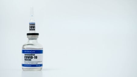 COVID-19 Corona Virus 2019-ncov Vaccine injection vials medicine drug ampoule bottle. Vaccination, immunization, treatment to cure Covid-19 Corona Virus infection. Healthcare And Medical concept.の写真素材