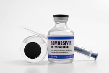 Remdesivir antiviral injectable drug vaccine medicine vial Covid-19 Corona Virus 2019-ncov syringe injection. Vaccination, immunization, treatment to cure Covid 19 Corona Virus disease Medical conceptの写真素材