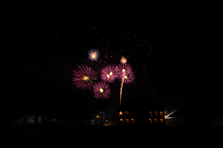 A fireworks display against the night skyの写真素材