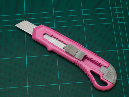 Knife cutter , put on  Blue rubber flooringの写真素材