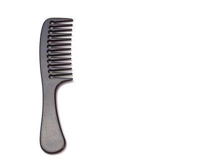 Large black comb , On a white background