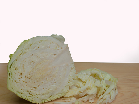 Cut cabbage on white background , healthy food.の写真素材