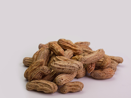 Boil peanut in the shell , Placed on a white background.