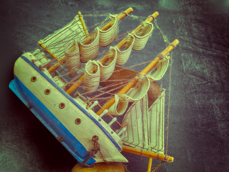 Simulation junk boat , On a black background . (vintage)
