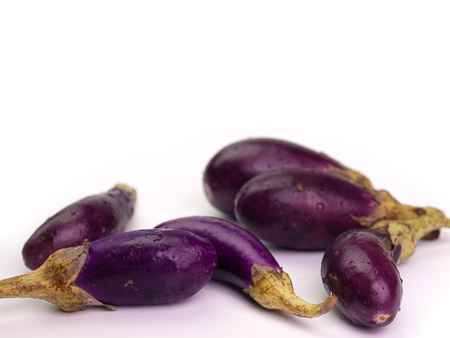 closeup ,Fresh healthy eggplants Placed on a  White background.の写真素材