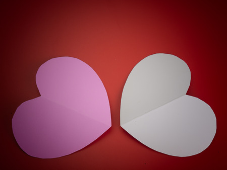 Valentine's day abstract background with cut paper heart.の写真素材