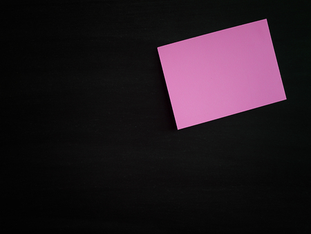 The paper on the blackboard, notes for add text message or design website.の写真素材