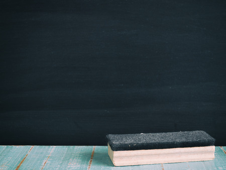 Chalk rubbed out on blackboard background, texture for abstract design.の写真素材