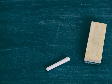 Chalk rubbed out on blackboard background, texture for abstract design.の写真素材