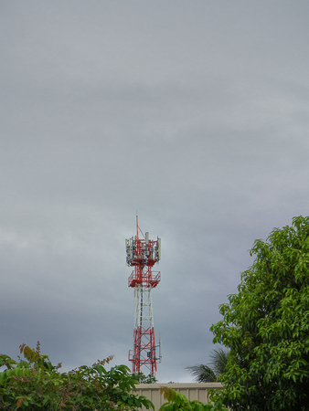 Telecommunication tower Antenna The background is sky.