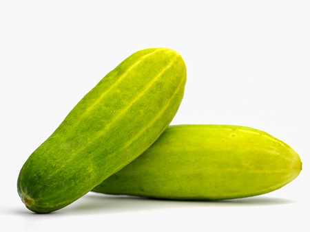 fresh cucumbers healthy food isolated on white background.の写真素材