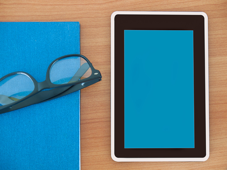 digital tablet finger touch blank screen , on work table.の写真素材