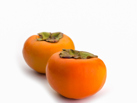Close Up Persimmon fruit , isolated on white background.の写真素材