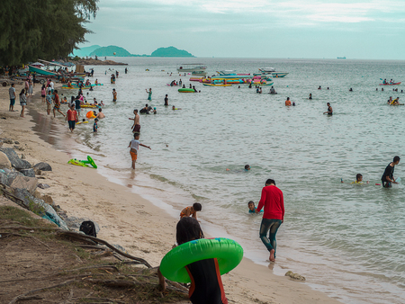 CHONBURI, THAILAND - November 11 , 2017 , View of tourists walking and playing on the beach at Nang Rum Beach (Sattahip)  in Chonburi , Thailand.のeditorial素材