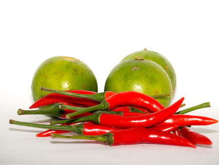 Fresh lemon  and chilli , isolated on white background. (with free space for text)の写真素材