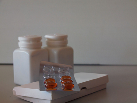 Close up Pharmaceutical medicament, cure in container for health , capsule pills with medicine antibiotic.の写真素材