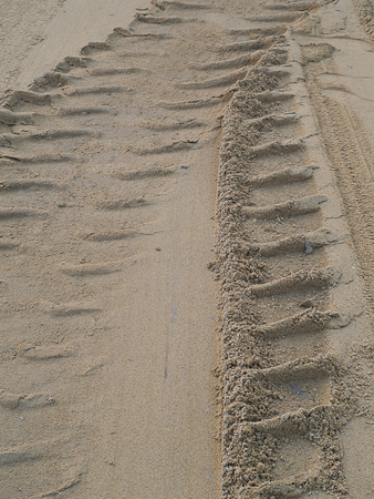 road with traces of tires, cars, cracks and dirt. To use as background.の写真素材