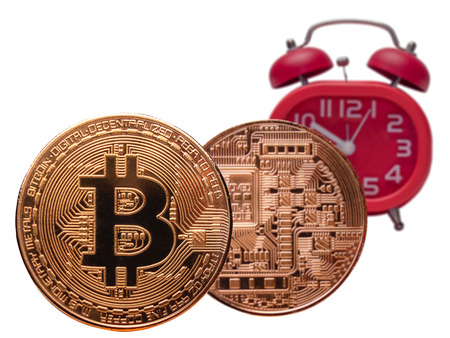 Golden bitcoin and vintage watch. time for new currency.(currency concept)の写真素材