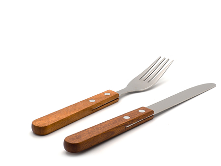 Knife and fork  isolated on white background. (with free space for text)の写真素材