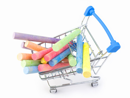 (Top view image) colorful chalk on chrome shopping cart. (education concept)の写真素材