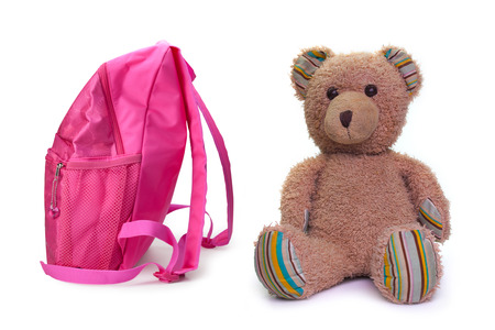 School backpack, and toy Teddy bear , on white background.
