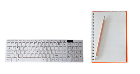 keyboard , notebook  on white background. (Ideas for work)の写真素材