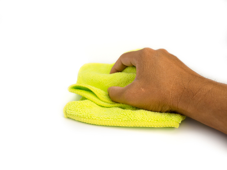 male hand holding microfiber cleaning cloth , on white background.の写真素材
