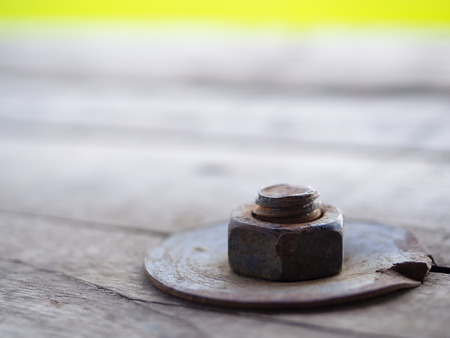 (Close Up) Steel nut on old wood.の写真素材