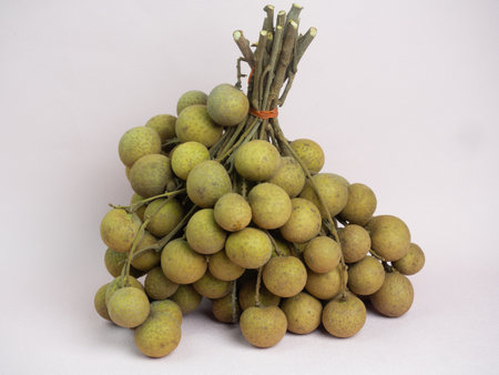 Fresh longan fruit on pink background.の写真素材