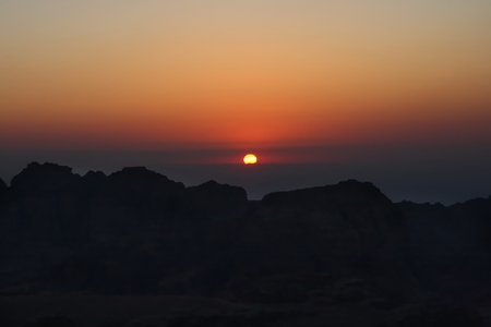 Last rays of sun light in a sunset over Petra's Valley, Jordanの写真素材