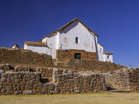 Facade of the colonial church of the Spaniards built on top of the ruins of the Inca village, Chinchero Village, Peruの写真素材