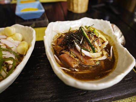 Ceviche Nikkei style: fresh tuna, garlic, fresh fish, lime & soy sauce and other secret ingredientsの写真素材