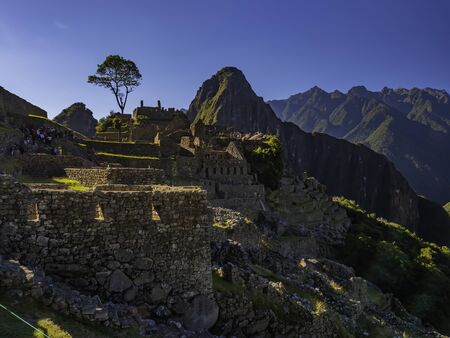 Archaeological complex of Machu Picchu with cultivation terraces and Huayna Picchu mountain as background. Late afternoon with few tourists. Cusco Region, Peruのeditorial素材