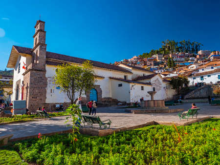 People walking, everyday life in San Blas square with old church as background. Traditional spanish colonial style on buildings. Cusco city, Peruのeditorial素材