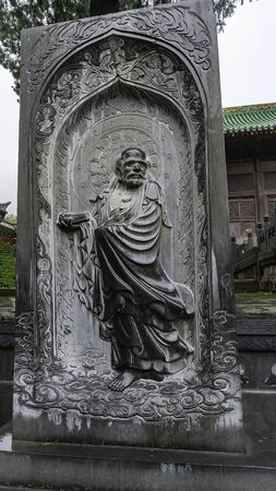 Commemorative palette to the philosopher Confucius. Figure carved on rock. Shaolin Monastery at Songshan Mountain, Henan province, Chinaの写真素材