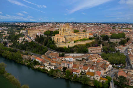 Aerial view of Beziers city: Saint Nazaire Cathedral, river and bridges. A landscape from France.の写真素材