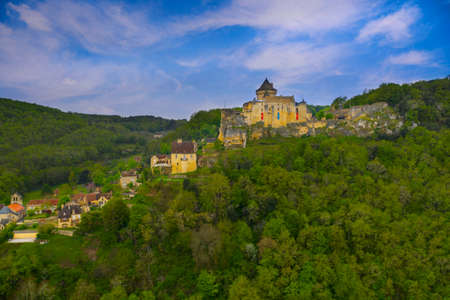 Aerial panorama of a medieval chateau in Castelnaud - La Chapelle. The village and castle are located above the confluence of the two rivers. Dordogne department in Nouvelle-Aquitaine in southwestern France.のeditorial素材