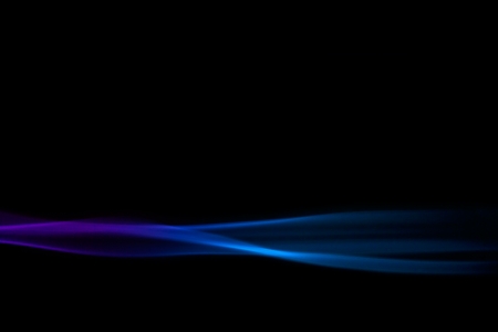 Colored Smoke on black backgroundの写真素材