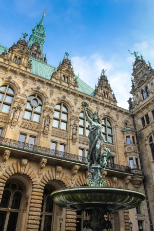 The Hamburg Town Hall and a Fountainの写真素材