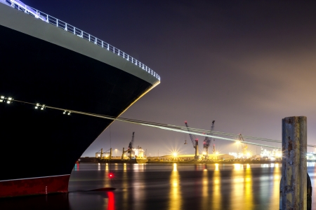A Large Cruise ship in the Port at nightの写真素材