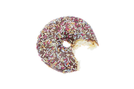 Donut with chocolate glaze, bite and sprinkles 