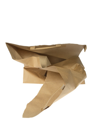 Torn brown Paper Bag isolated on white backgroundの写真素材