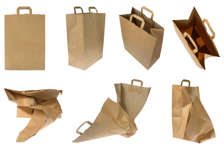 Collection of brown Paper bags in different views and angels isolated on white backgroundの写真素材