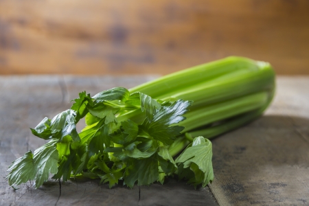 Celery, Celeriac on rustic wooden tableの写真素材